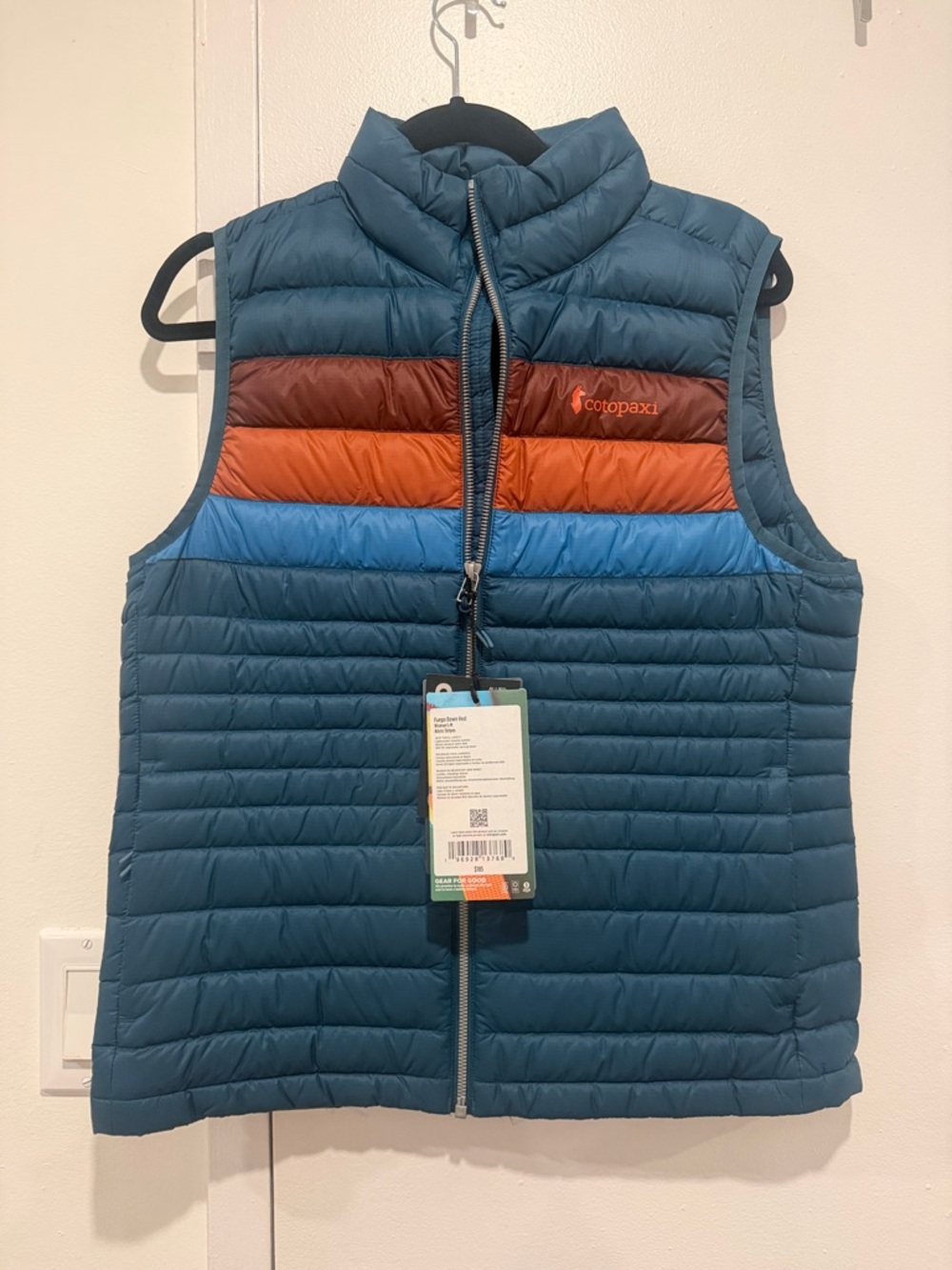 cotopaxi Teal Quilted Vest with Rust and Bright Blue Stripes